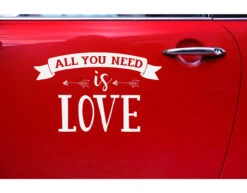 Autosticker All You Need Is Love 45cm -Feestspullen Winkel autosticker all you need is love 45cm 2